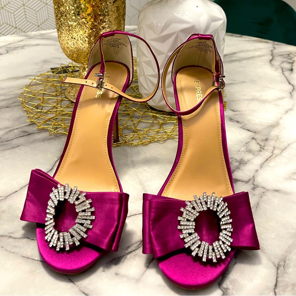 Beautiful wine colored ankle strap heel with rhinestone detail.